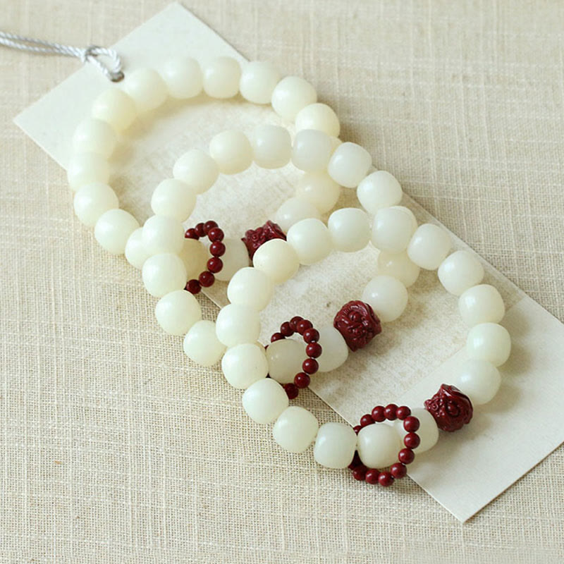 Natural Bodhi Seed Cinnabar Dancing Lion Charm Wisdom Harmony Wrist Mala