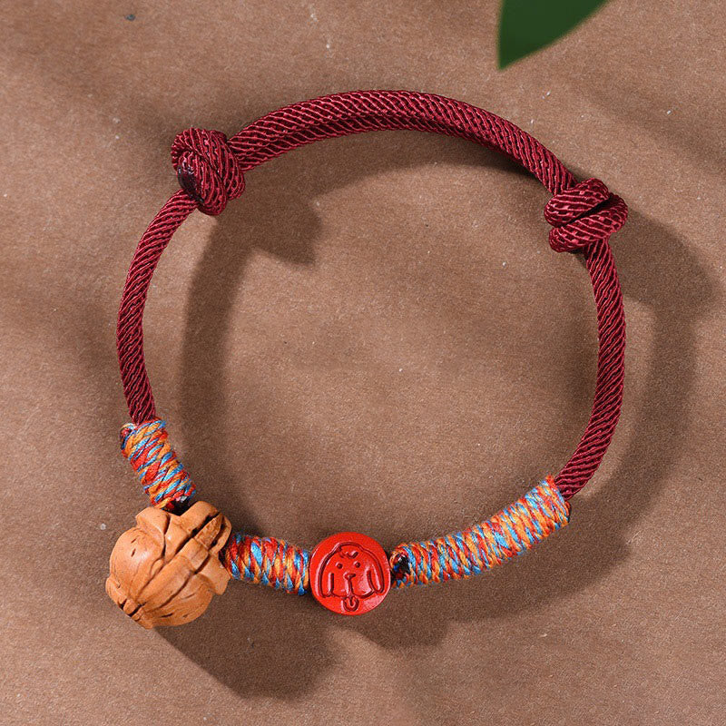 Handmade Chinese Zodiac Red String Peach Pit Cinnabar Luck Bracelet