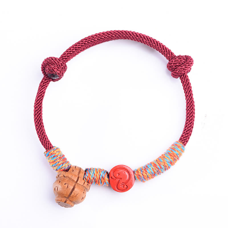 Handmade Chinese Zodiac Red String Peach Pit Cinnabar Luck Bracelet