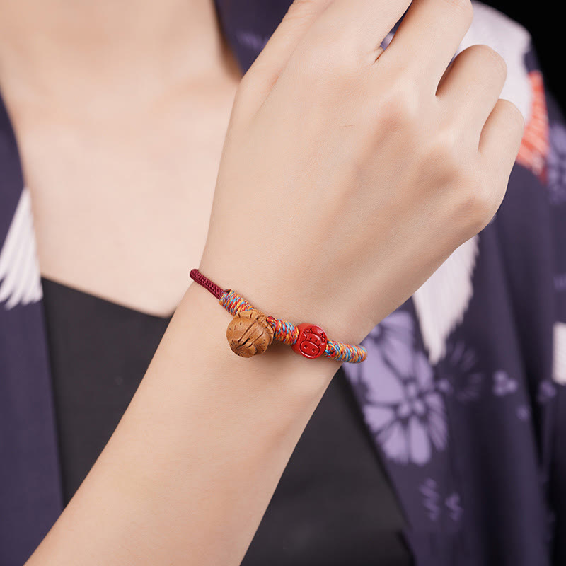 Handmade Chinese Zodiac Red String Peach Pit Cinnabar Luck Bracelet