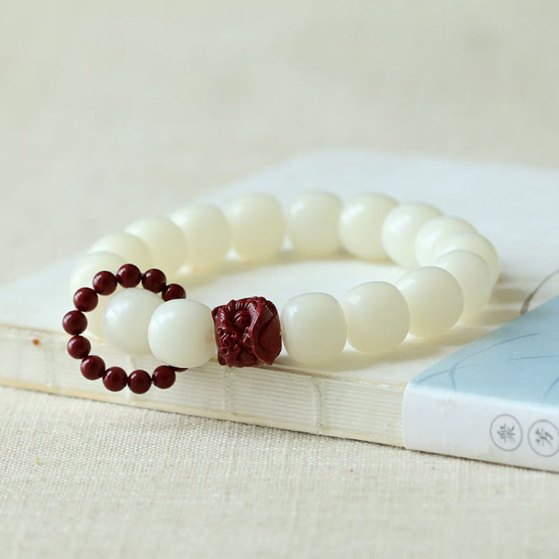 Natural Bodhi Seed Cinnabar Dancing Lion Charm Wisdom Harmony Wrist Mala