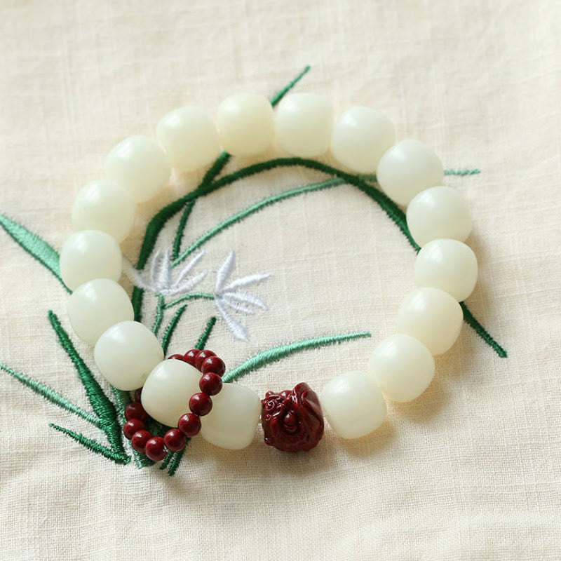 Natural Bodhi Seed Cinnabar Dancing Lion Charm Wisdom Harmony Wrist Mala