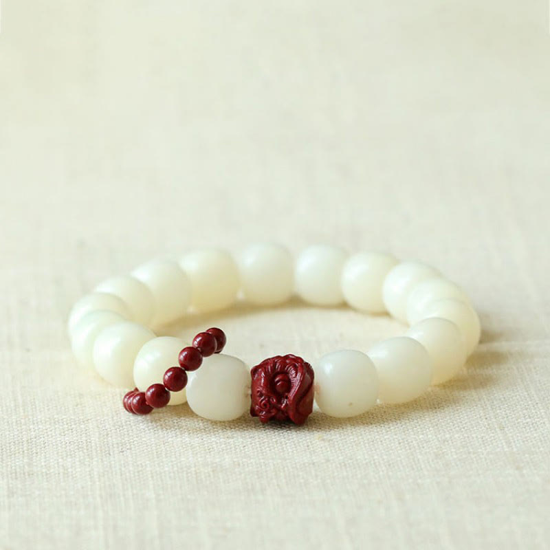 Natural Bodhi Seed Cinnabar Dancing Lion Charm Wisdom Harmony Wrist Mala