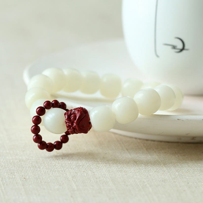 Natural Bodhi Seed Cinnabar Dancing Lion Charm Wisdom Harmony Wrist Mala
