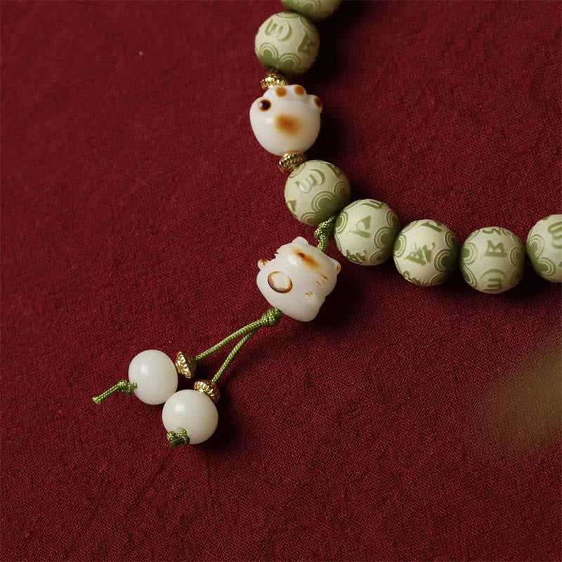 Green Bodhi Seed Cat Paw Om Mani Padme Hum Engraved Wisdom Bracelet